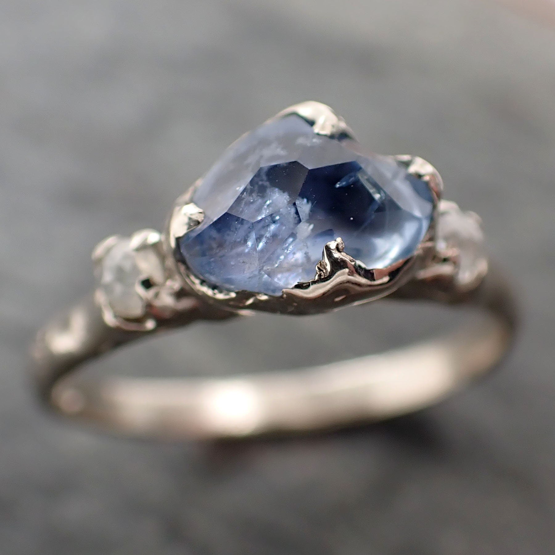 Partially Faceted Sapphire with fancy cut Diamond