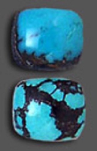 Two polished square turquoise but with curved edges and a black map-like pattern