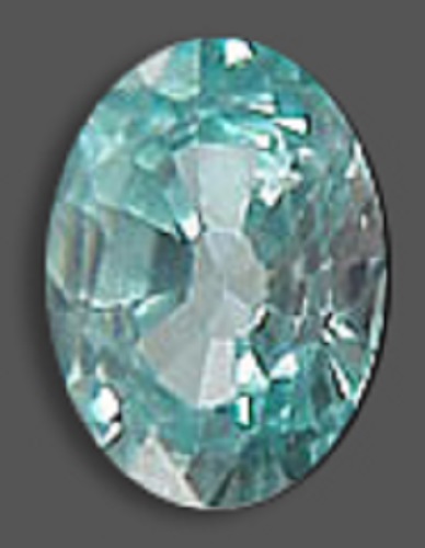 A polished multifaceted oval-shaped light blue zircon