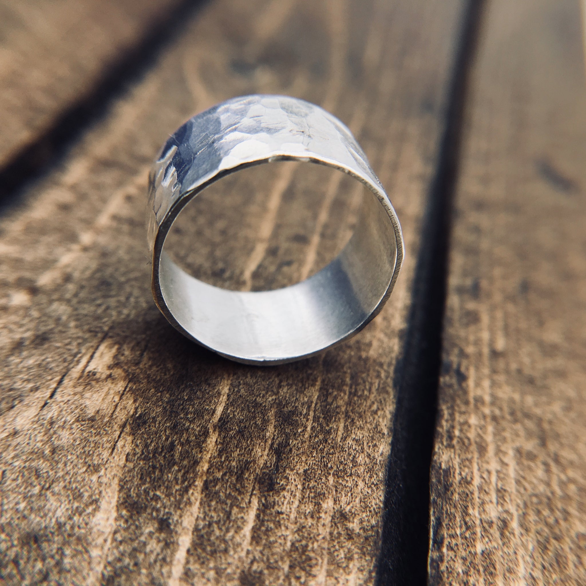 Classic Hammered Band On Wooden Surface