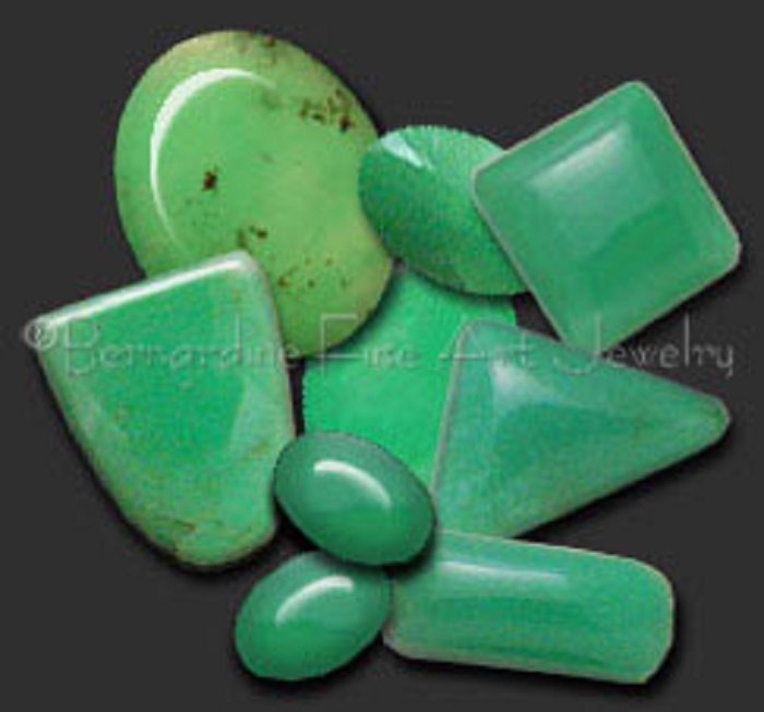 Nine pieces of polished small and large green chrysoprase cabochons in different shapes