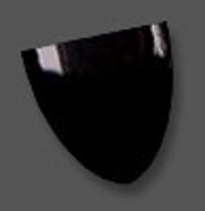 A pure black onyx shaped like a heraldic shield, with the top flat and the bottom sharply curved