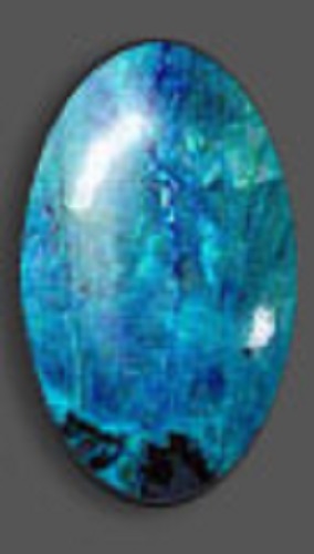 A polished elongated oval-shaped blue Quantum Quattro