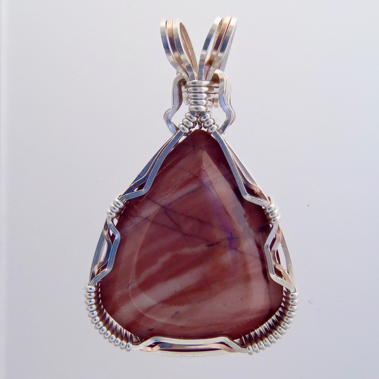 Michigan's pink Kona Dolomite stone pendant