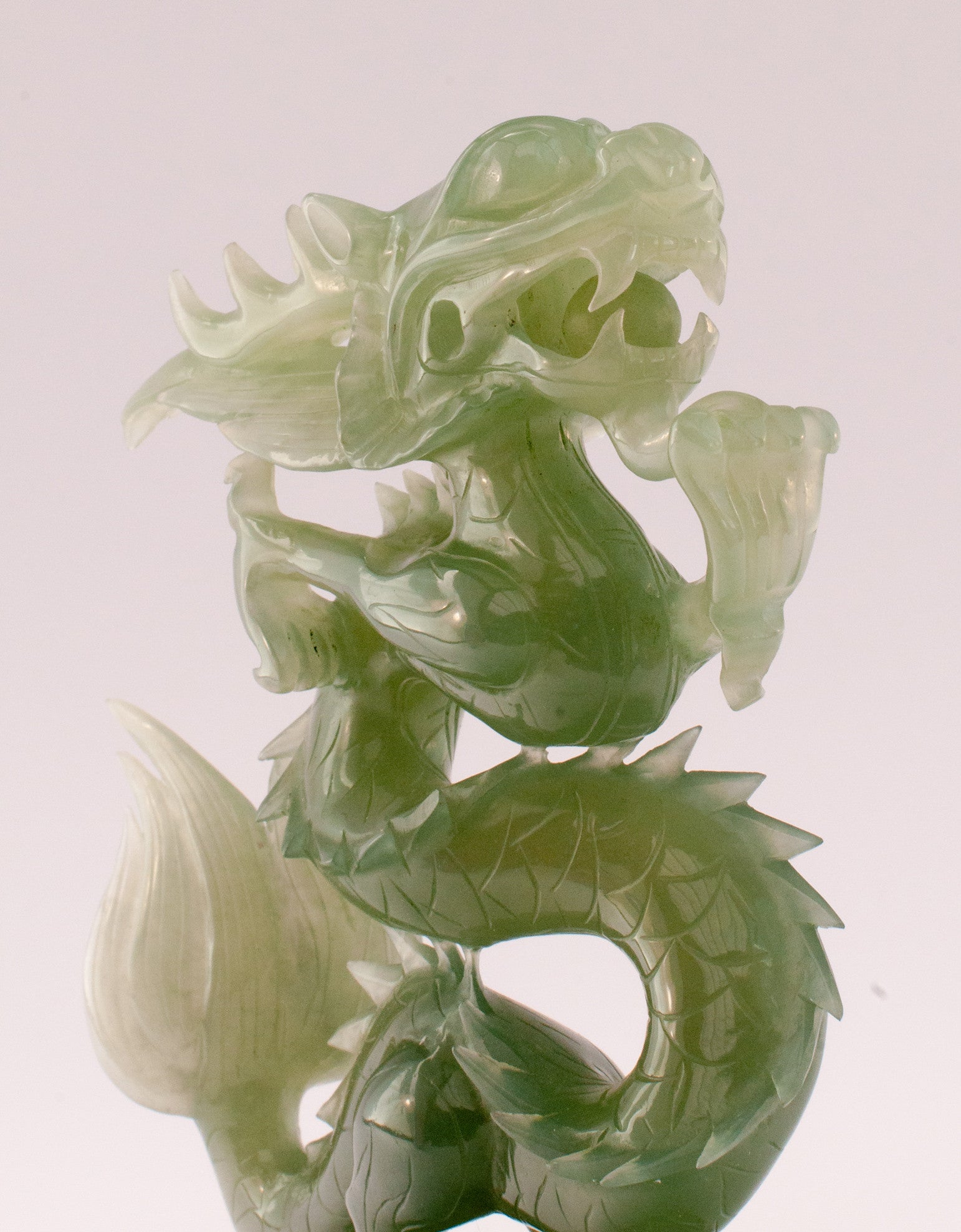 A superb carved green jade Dragon