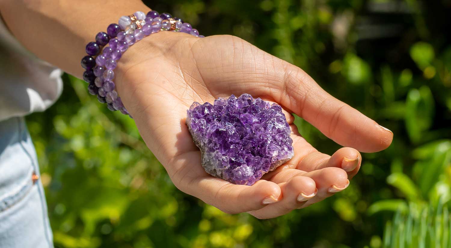 Woman Holding Amethyst Crystals